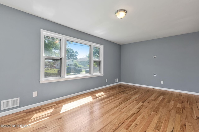 7 Beechwood Ave, Keansburg, NJ 07734 - empty room with light wood-type flooring and baseboards