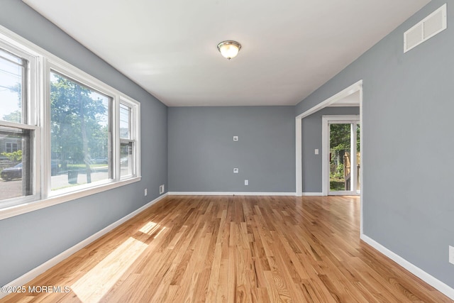 7 Beechwood Ave, Keansburg, NJ 07734 - empty room featuring light wood-style floors and baseboards
