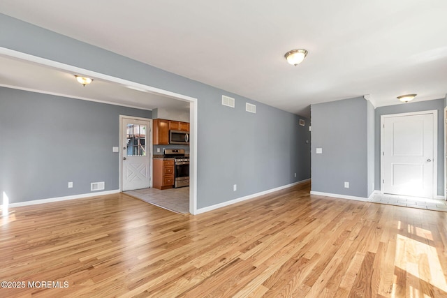 7 Beechwood Ave, Keansburg, NJ 07734 - spare room with light wood-type flooring and baseboards