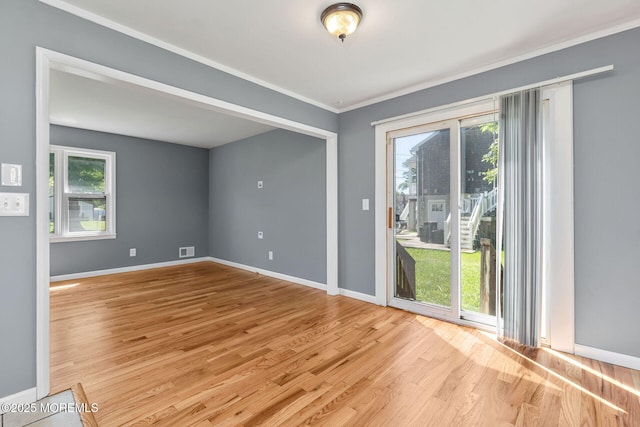7 Beechwood Ave, Keansburg, NJ 07734 - unfurnished room featuring wood finished floors, baseboards, and crown molding