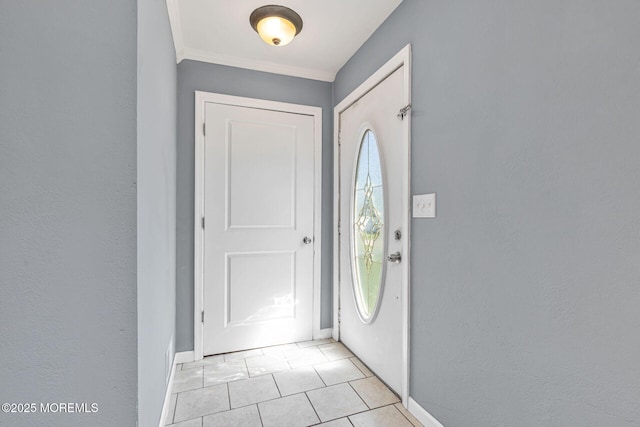 7 Beechwood Ave, Keansburg, NJ 07734 - entryway with baseboards, light tile patterned flooring, and crown molding