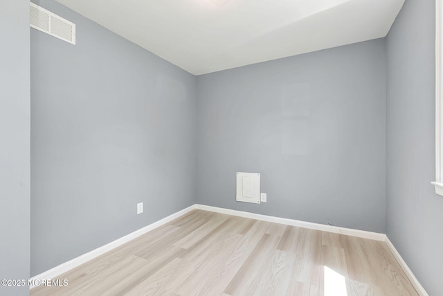 7 Beechwood Ave, Keansburg, NJ 07734 - spare room with wood finished floors and baseboards