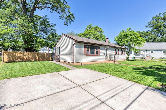 7 Beechwood Ave, Keansburg, NJ 07734 - view of front of home with crawl space and a chimney