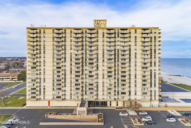 787 Ocean Ave Unit 1711, Long Branch, NJ 07740 - view of apartment building / complex featuring uncovered parking and a water view