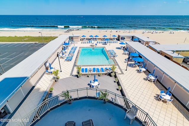 787 Ocean Ave Unit 1711, Long Branch, NJ 07740 - drone / aerial view of waterfront with a beach and a pool