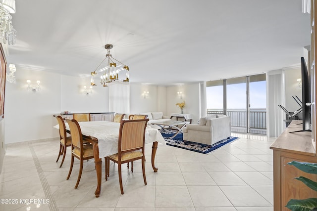 787 Ocean Ave Unit 1711, Long Branch, NJ 07740 - dining space with expansive windows, light tile patterned floors, and a chandelier