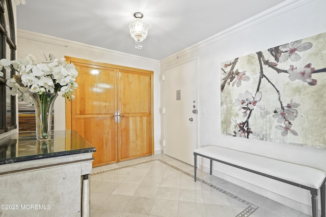 787 Ocean Ave Unit 1711, Long Branch, NJ 07740 - entryway with ornamental molding, a chandelier, and light tile patterned floors