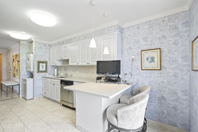 787 Ocean Ave Unit 1711, Long Branch, NJ 07740 - kitchen featuring dishwasher, light tile patterned flooring, light countertops, a peninsula, and crown molding