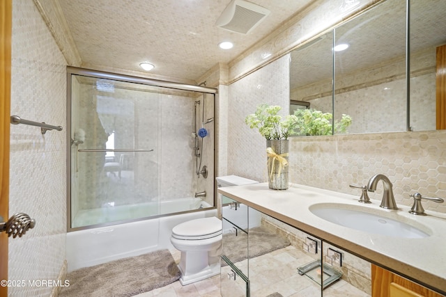 787 Ocean Ave Unit 1711, Long Branch, NJ 07740 - full bath featuring toilet, bath / shower combo with glass door, vanity, and backsplash