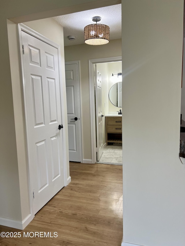 5 Lincoln Ct, Tinton Falls, NJ 07712 - hall featuring light wood-type flooring and baseboards