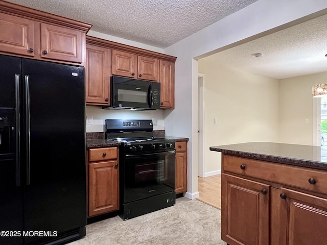 5 Lincoln Ct, Tinton Falls, NJ 07712 - kitchen with black appliances, a textured ceiling, brown cabinetry, a chandelier, and baseboards