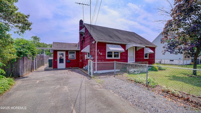 116 Hudson Ave, Hazlet, NJ 07734 - view of front of house with a chimney, a gate, and roof with shingles
