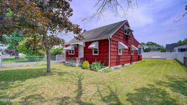 116 Hudson Ave, Hazlet, NJ 07734 - view of home's exterior featuring roof with shingles