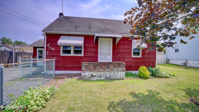 116 Hudson Ave, Hazlet, NJ 07734 - view of front of property with a chimney and roof with shingles