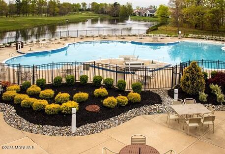 34 Shoal Rd, Jackson, NJ 08527 - community pool with a water view and a patio area