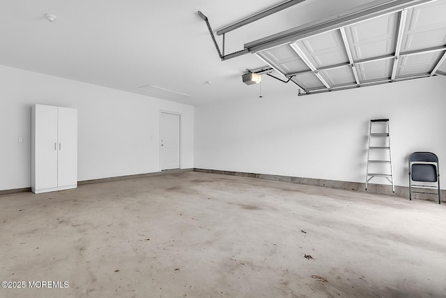 34 Shoal Rd, Jackson, NJ 08527 - garage with a garage door opener and baseboards