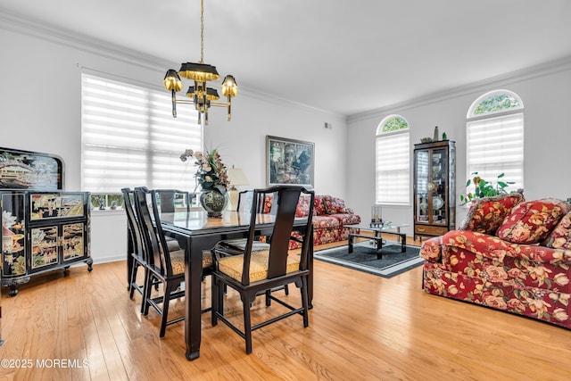 34 Shoal Rd, Jackson, NJ 08527 - dining space featuring a chandelier, light wood finished floors, and crown molding