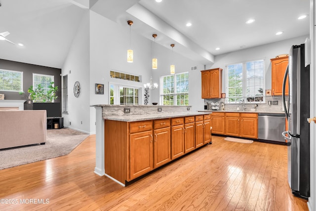 34 Shoal Rd, Jackson, NJ 08527 - kitchen with stainless steel appliances, light wood-type flooring, open floor plan, plenty of natural light, and recessed lighting