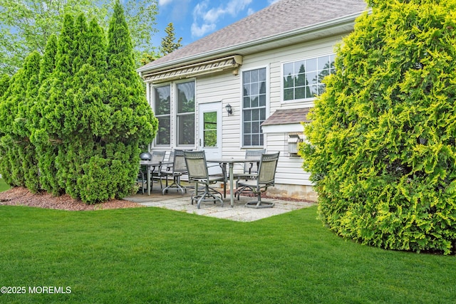 34 Shoal Rd, Jackson, NJ 08527 - rear view of house featuring a shingled roof, a patio, and a lawn