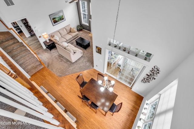 34 Shoal Rd, Jackson, NJ 08527 - living area featuring a high ceiling, wood finished floors, and a chandelier