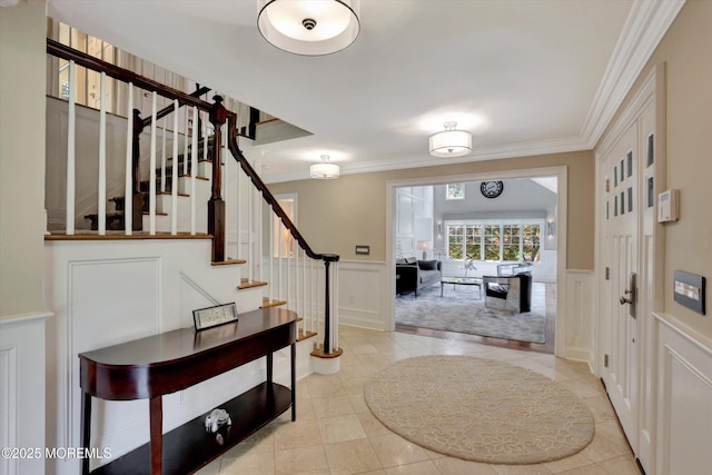 12 Wagon Way, Holmdel, NJ 07733 - entryway featuring a decorative wall, stairway, crown molding, wainscoting, and light tile patterned floors