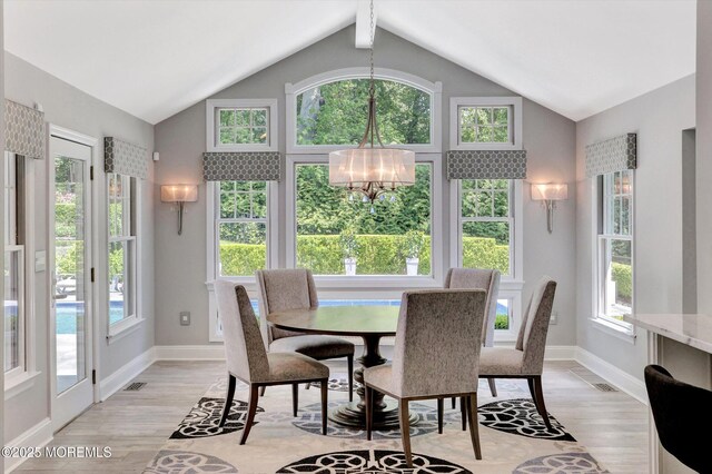 12 Wagon Way, Holmdel, NJ 07733 - dining area featuring plenty of natural light, a chandelier, light wood-type flooring, and baseboards