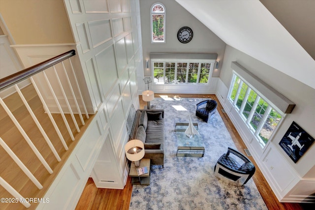 12 Wagon Way, Holmdel, NJ 07733 - living room with wood finished floors, high vaulted ceiling, and stairway