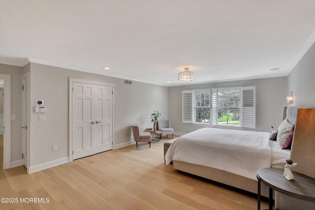 12 Wagon Way, Holmdel, NJ 07733 - bedroom featuring crown molding, light wood-type flooring, recessed lighting, baseboards, and a closet