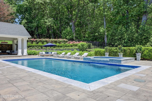 12 Wagon Way, Holmdel, NJ 07733 - view of pool featuring an outdoor living space, a patio area, and a pool with connected hot tub