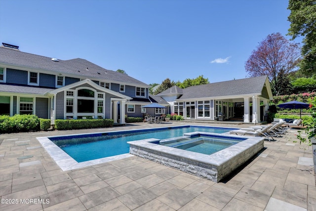 12 Wagon Way, Holmdel, NJ 07733 - view of swimming pool with a storage structure, a patio, an outdoor structure, and a pool with connected hot tub