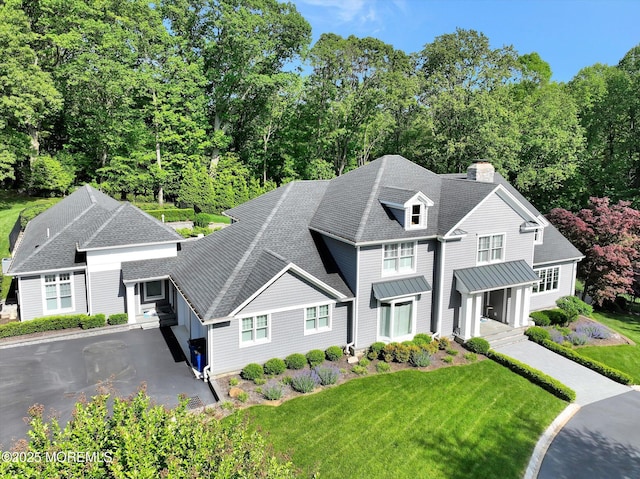 12 Wagon Way, Holmdel, NJ 07733 - shingle-style home with a chimney, a front lawn, and a shingled roof
