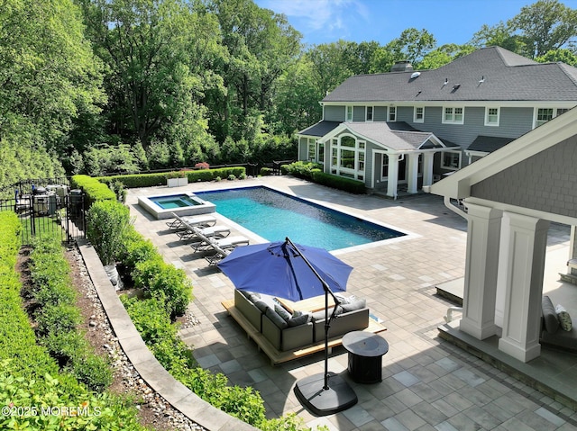 12 Wagon Way, Holmdel, NJ 07733 - view of swimming pool featuring a patio and a pool with connected hot tub