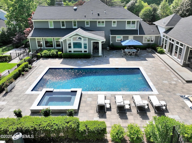 12 Wagon Way, Holmdel, NJ 07733 - view of swimming pool with a patio, a fenced backyard, and a pool with connected hot tub