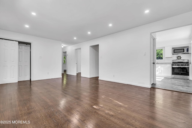 1324 Sixth Ave, Toms River, NJ 08757 - unfurnished living room with dark wood finished floors, recessed lighting, and baseboards