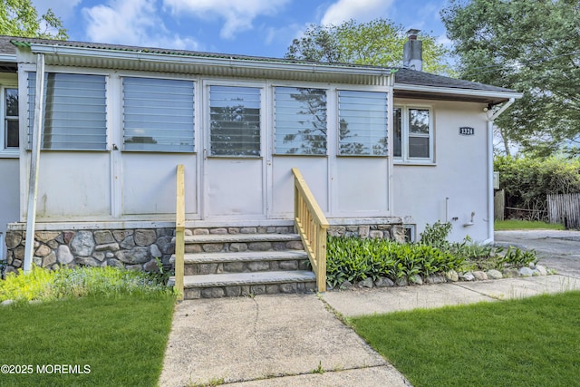 1324 Sixth Ave, Toms River, NJ 08757 - entrance to property featuring a chimney and stucco siding