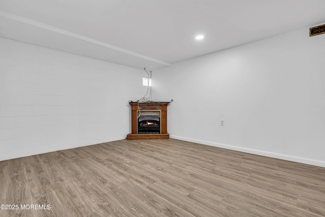 1324 Sixth Ave, Toms River, NJ 08757 - unfurnished living room featuring wood finished floors, a warm lit fireplace, recessed lighting, and baseboards