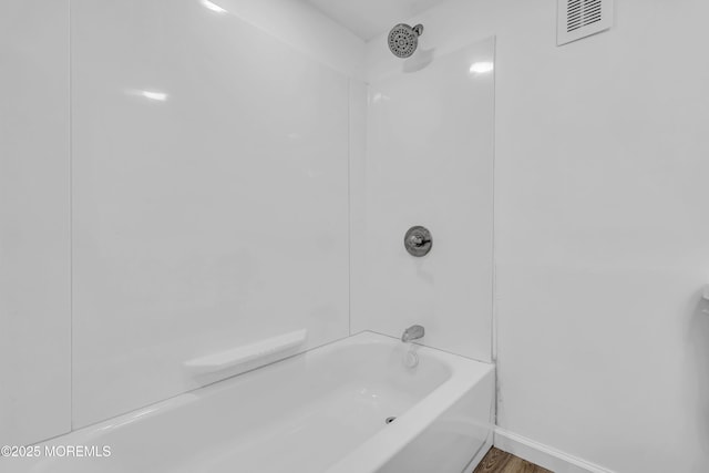 1324 Sixth Ave, Toms River, NJ 08757 - bathroom featuring tub / shower combination, baseboards, and wood finished floors