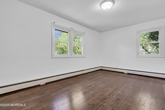 1324 Sixth Ave, Toms River, NJ 08757 - spare room with healthy amount of natural light, wood finished floors, and baseboard heating