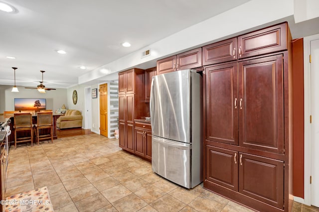 16 Markwood Dr, Howell, NJ 07731 - kitchen with freestanding refrigerator, a ceiling fan, recessed lighting, open floor plan, and light tile patterned floors