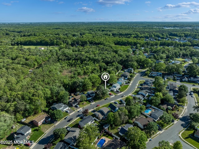 16 Markwood Dr, Howell, NJ 07731 - aerial view of property's location featuring a heavily wooded area and nearby suburban area