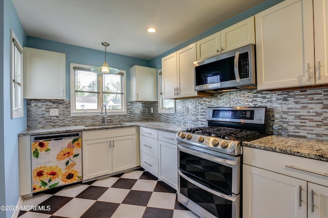 206 Arlington Ave, Union Beach, NJ 07735 - kitchen featuring appliances with stainless steel finishes, a sink, dark flooring, decorative backsplash, and recessed lighting