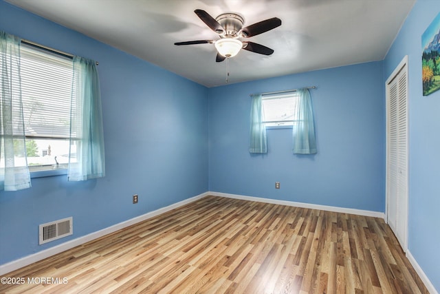 206 Arlington Ave, Union Beach, NJ 07735 - spare room with wood finished floors, baseboards, and ceiling fan
