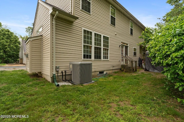 6 Foxmoor Ln, Bayville, NJ 08721 - rear view of property with central AC and a yard