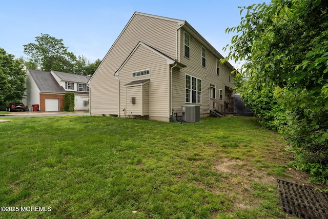 6 Foxmoor Ln, Bayville, NJ 08721 - view of front of property featuring central AC, a front yard, and a detached garage