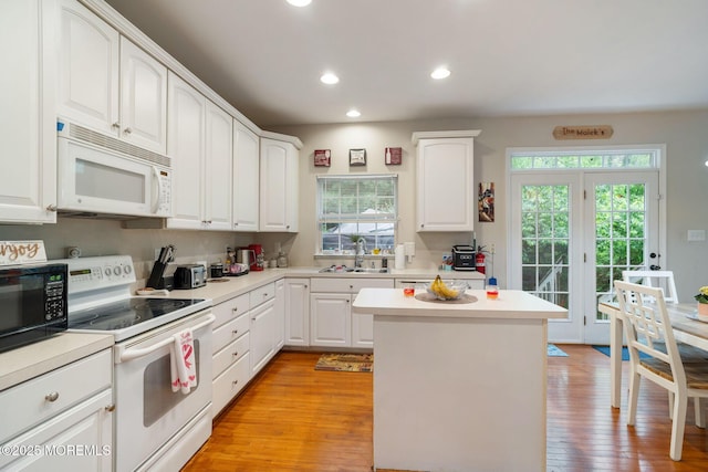 6 Foxmoor Ln, Bayville, NJ 08721 - kitchen with white appliances, a sink, healthy amount of natural light, recessed lighting, and light wood-type flooring