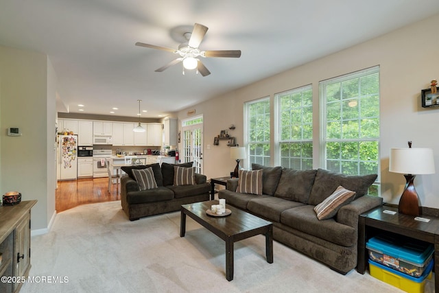 6 Foxmoor Ln, Bayville, NJ 08721 - living area featuring a ceiling fan, baseboards, and light carpet