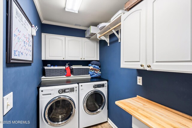 660 Fairview Ln, Forked River, NJ 08731 - laundry room featuring cabinet space, separate washer and dryer, and ornamental molding