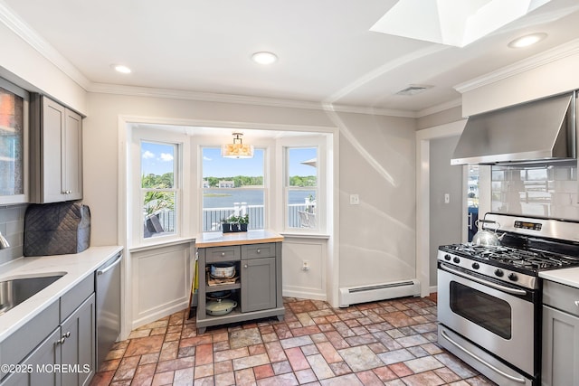 660 Fairview Ln, Forked River, NJ 08731 - kitchen with stainless steel appliances, gray cabinetry, baseboard heating, wall chimney range hood, and brick flooring