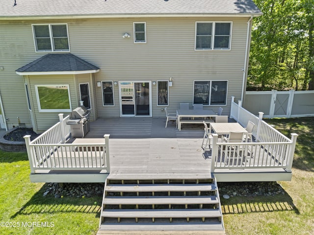 274 Beachview Ave, Manahawkin, NJ 08050 - back of property featuring outdoor dining area, roof with shingles, a gate, and a wooden deck
