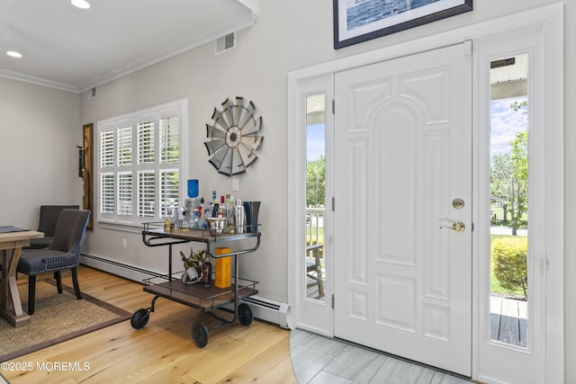 274 Beachview Ave, Manahawkin, NJ 08050 - foyer with crown molding, light wood finished floors, recessed lighting, and baseboard heating